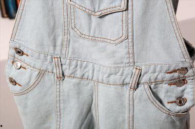 国产牛仔裤自动贴袋视频,高效便捷的智能制造之旅